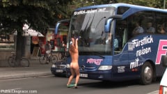 Molly - Flexible redhead is bound and stripped naked in public | Picture (11)