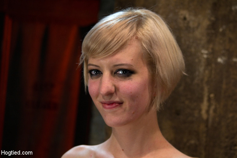 Blond with killer natural body, is suspended, suffers intense foot caning Made to cum over and over