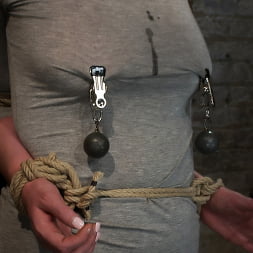 Redhead with cute freckles bound tightly and made to cum! Big puffy nipples clamped and weighted
