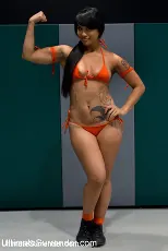 Hollie Stevens - RD2: Girls helpless in wrestling holds, getting double teamed. Finger fucked and beaten on the mat. | Picture (11)