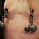 Rene Phoenix in 'Tiny sexy blond suffers heavy weighted nipple clamps and a crotch burner that keeps her on her toes!'